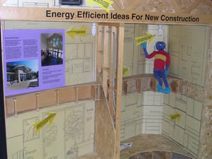 image of Energy Ant with display of energy efficient construction ideas