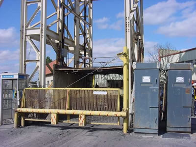 Picture of cage elevator at top of mine shaft.