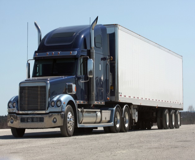 A photograph of a large freight truck that has a diesel engine