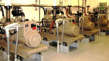 A photograph of a diesel-fueled electricity generators in the village of Tulaksak, Alaska.