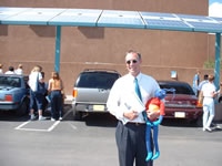Image of Energy Ant and Chris Wentz, the Director of the Energy Conservation and Management Division, New Mexico Energy, Minerals, and Natural Resources Department