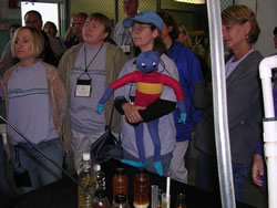 Picture of Energy Ant with kids at Upper Cape Cod Regional Technical School