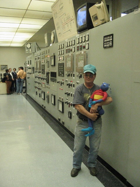 Energy ant cuddle by electric plant worker